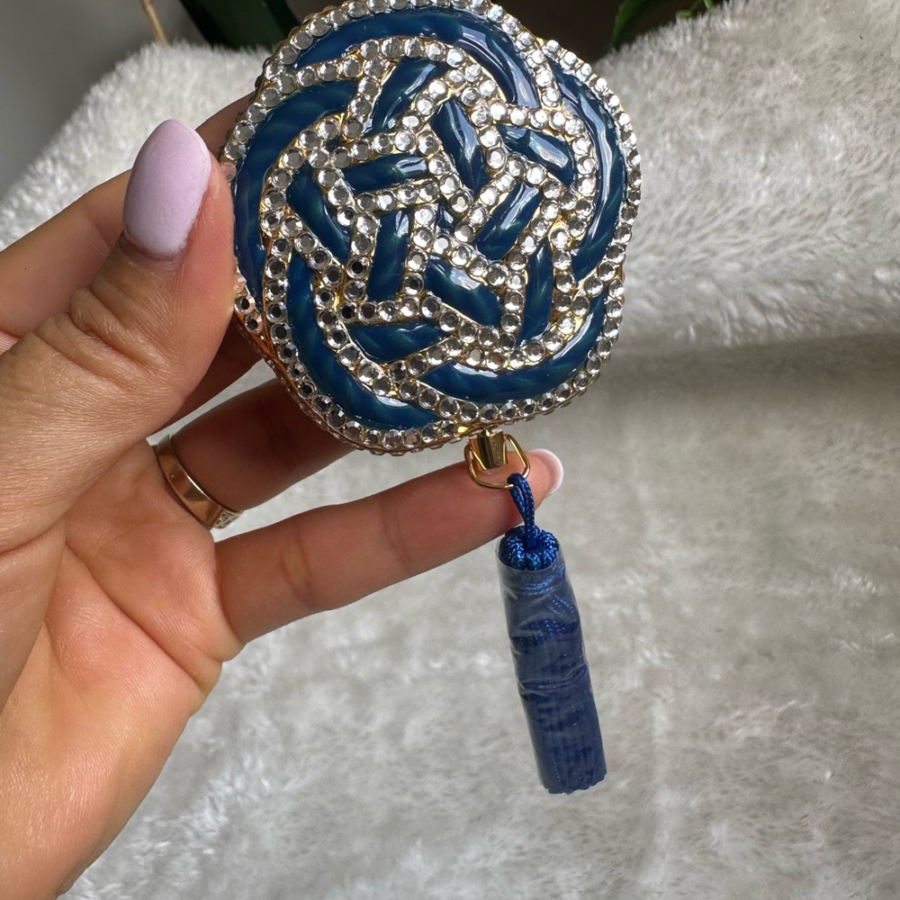 Estee Lauder Blue and Gold Brooch with Intricate Filigree